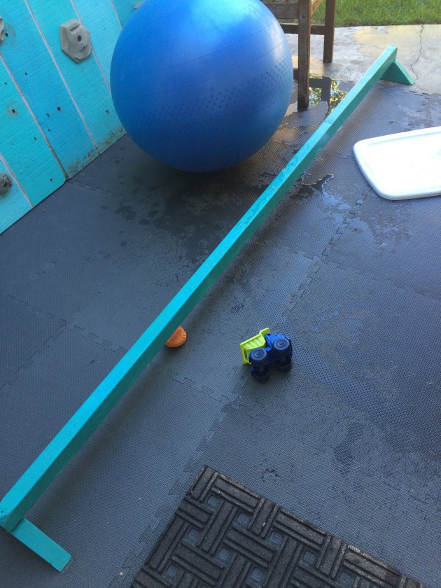 Here is the balance beam Daddy built for you. Your activity levels have forced us to get creative and build things to keep your body engaged and happy!