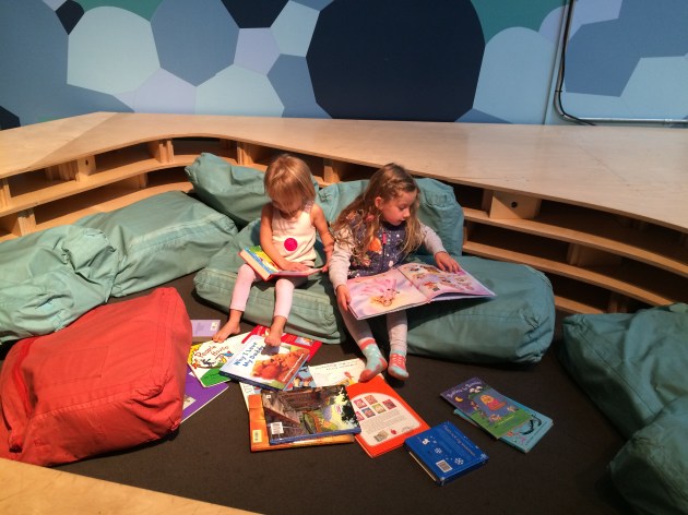 You and Stella reading at the Children's Museum.